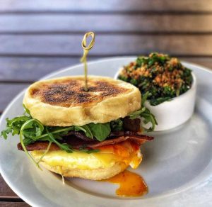 Sustainable and healthy breakfast sandwich and kale salad, all locally-sourced at The Grove Cafe in Albuquerque, NM.
